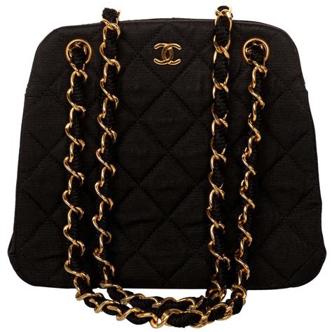 chanel black purse on chain|Chanel quilted bag gold chain.